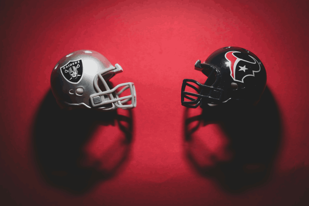 Two American football helmets